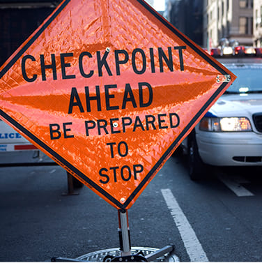 Sobriety checkpoint ahead sign